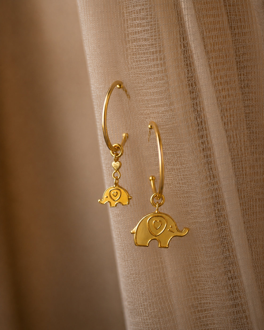 Ele & Calf Mismatched Hoops