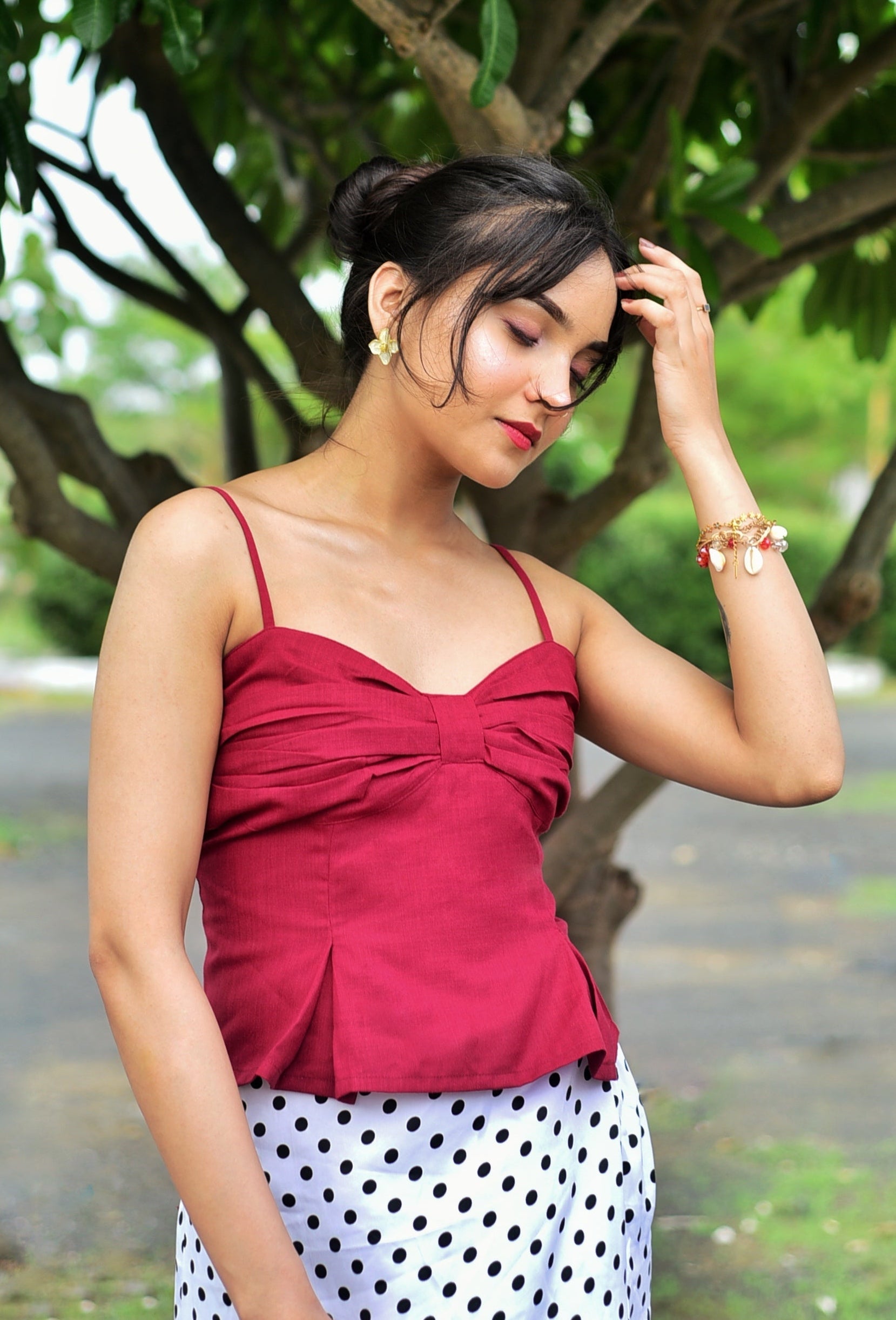Rosy pleated top in crimson