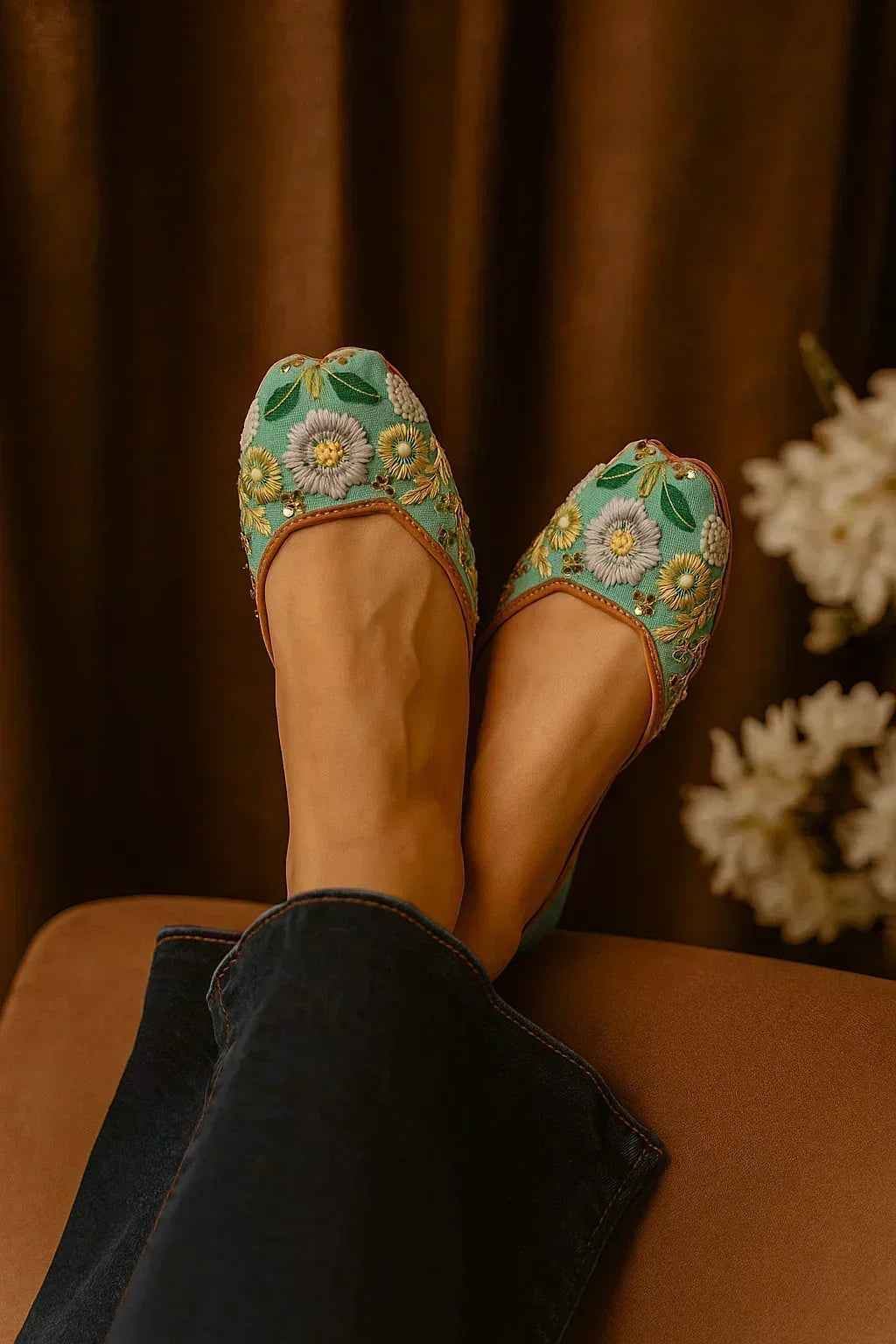 Handcrafted floral embroidered juttis in mint green, perfect for romantic styles and seasonal elegance.